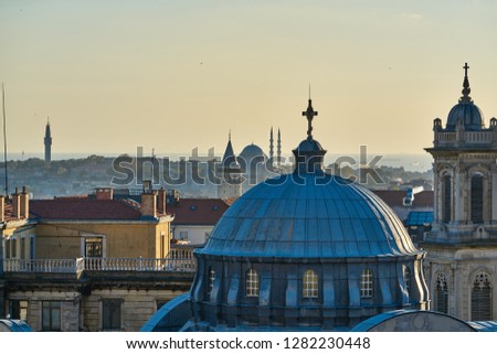 All together: Hagia Triada Greek Orthodox Church, Galata Tower, Suleymaniye Mosque. Istanbul cityscape with landmarks at sunset. 