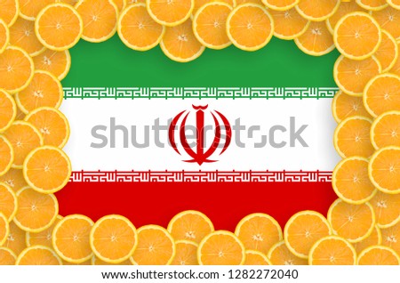 Iran flag  in fresh citrus fruit slices frame