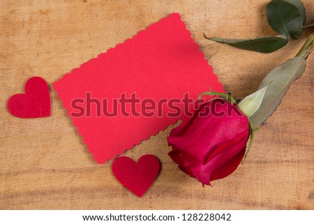 Red  rose and card for text