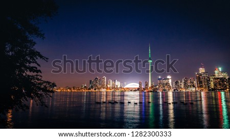 Toronto Skyline View from Centre Island at night  Royalty-Free Stock Photo #1282300333
