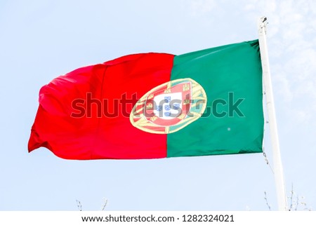 flag of turkey waving in the wind in front of white background, in Lisbon Capital City of Portugal