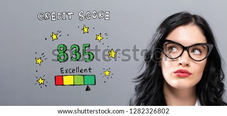 Excellent credit score with young businesswoman in a thoughtful face