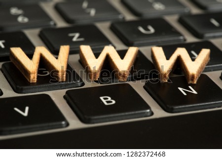 A computer and letters WWW