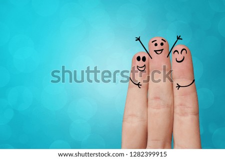 Joyful fingers smiling with colorful background concept
