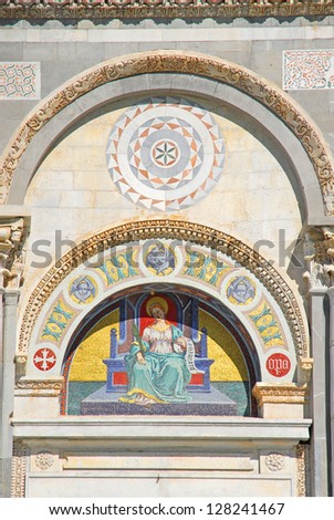Italy, Pisa: lunette baptistery door decoration.