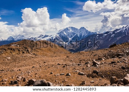 The main Caucasus range, mount Donguzorun and glacier Seven  with mount Elbrus