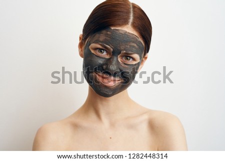 woman in clay mask portrait