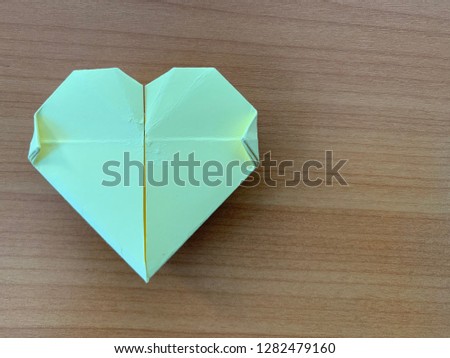 Design heart shape on brown background