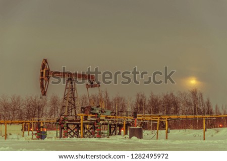 Pump jack. Extraction of oil. Petroleum concept.