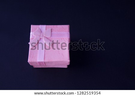 Pink Gift Box on Black Background