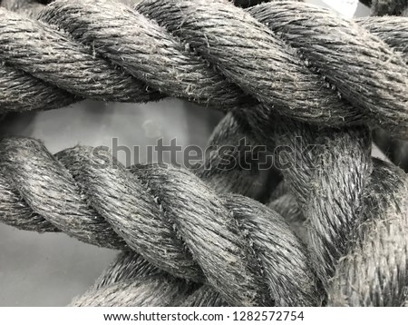blurry picture of black rope, black and white color background, vintage style. 