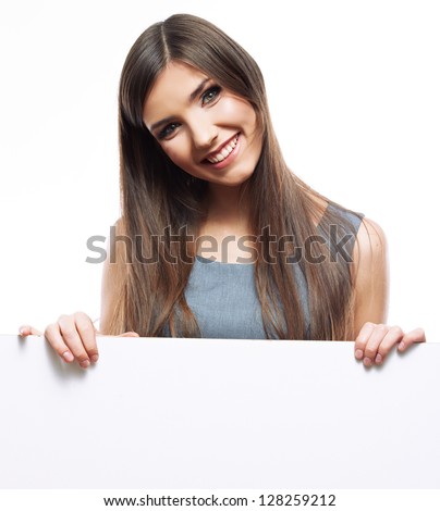 Business woman hold white blank paper. Young smiling woman show blank card. Girl portrait isolated on white background with advertising billboard .