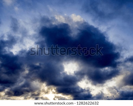 blue sky background with tiny clouds. sky panorama with scattered cumulus dark clouds for  for background backdrop wallpaper, desktop and designer