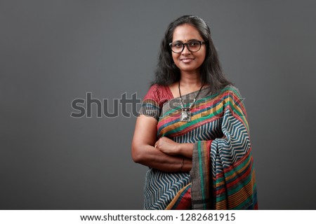 Portrait of a woman of Indian origin wearing sari Royalty-Free Stock Photo #1282681915