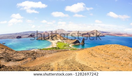 Panoramic view of " Isla Bartolome " at Galapagos Islands archipelago - Travel and wanderlust concept exploring world nature wonders around Ecuador - Vivid filter with warm bright color tones 