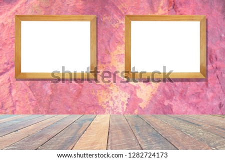 red wall and empty wood desk and Wooden frame .Blank space for text and images.