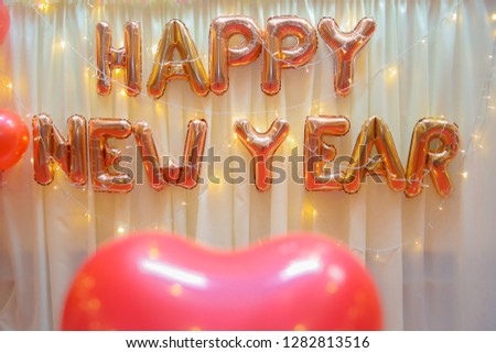 Blurred images of balloons with warm lighting in the conference room for the background