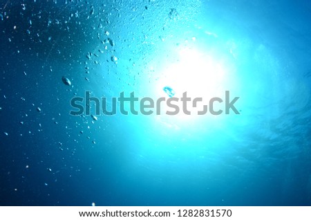 Underwater sun ocean