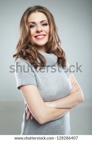 portrait of smiling woman crossed arms  isolated on white background