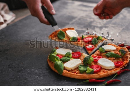 pizza vegetables and cheese (broccoli, mozzarella basil and others). food background