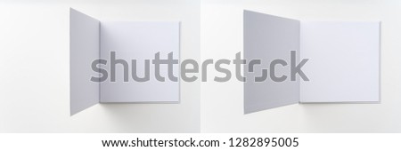 Design concept - view white hardcover notebook with open cover isolated on background for mockup. Not 3D render