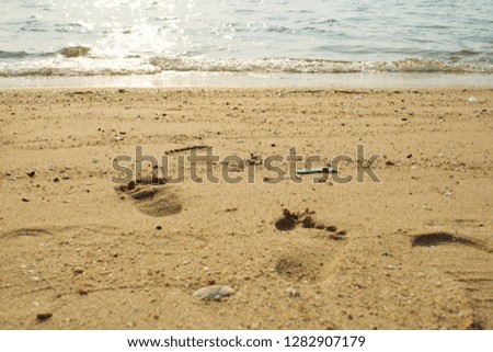 sea background, Footprints on the sand and sea