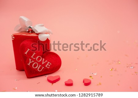 Valentine day composition: white gift boxes with bow and red felt hearts, photo template, background. Top View. View from above.
