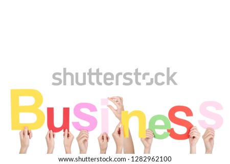 Hands holding the word Business on white background