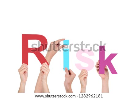 Hands holding the word Risk on white background