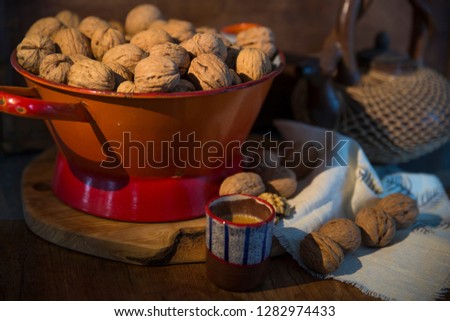 walnuts in red bowl