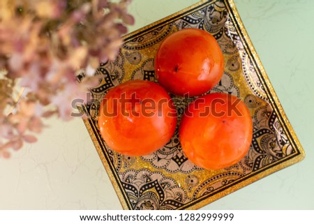 useful persimmon on the table