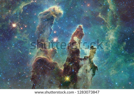 Cosmic galaxy background with nebulae, stardust and bright stars. Elements of this image furnished by NASA.