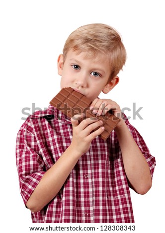 boy eat chocolate on white