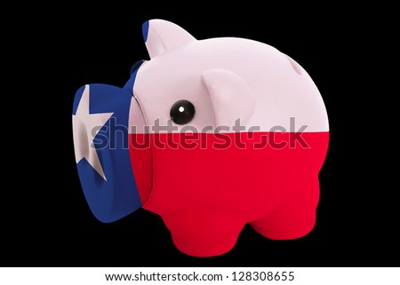 piggy rich bank in colors flag of us state of texas for saving money on black background