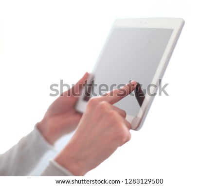 close up.woman's hand pressing on screen digital tablet .photo w