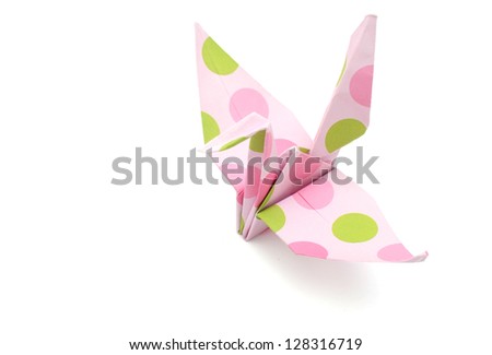 Origami paper bird on white background.
