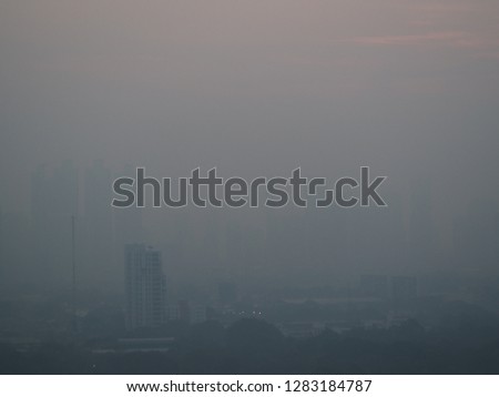cityscape of dangerous air pollution or smog