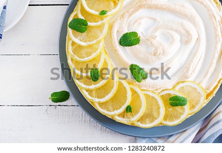 Tart with lemon curd  and meringue. Lemon  pie. American cuisine. Dessert. Top view