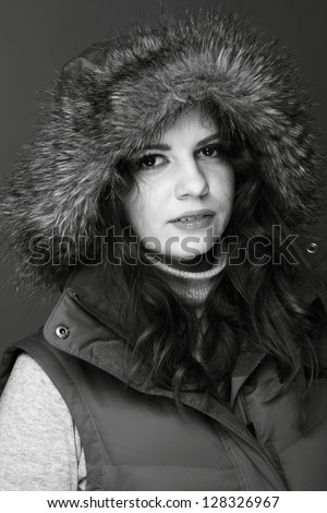 Black and white picture girl in winter clothes