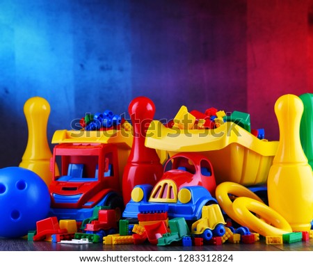 Composition with colorful plastic children toys.
