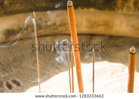 Smoke From Burning Incense Into A Big Incense Burner For Praying. Close Up Shot Of  Incense,Taiwan. Image For Templates, Placards, Banners, Presentations, Reports, Card And Wallpaper. etc