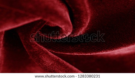 Texture background, pattern. red velveteen. Rock the runway with this beautiful high fashion fabric. This medium weight fabric has a beautiful shine with a velvet face for a feeling of luxury.