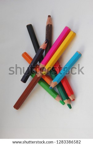 bunch of crayons  on white background
