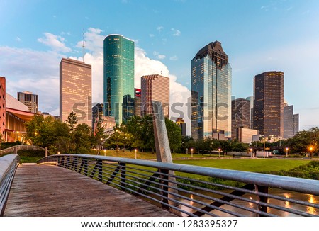 Pedestrian Bridge crossing over Houston's Buffalo Bayou with a beautiful view of Downtown Houston Skyline in the background!