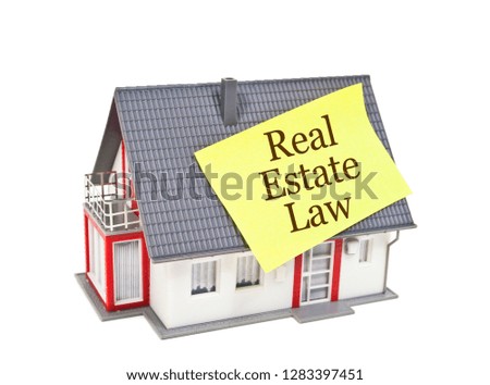 Golden sign with gavel and real estate law