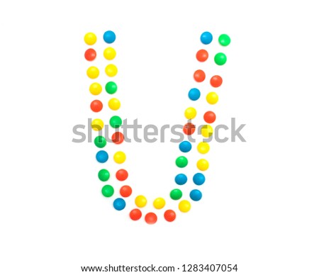 Multicolored alphabet from children's mosaic letter U