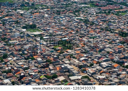 Population housing in Jakarta Royalty-Free Stock Photo #1283410378
