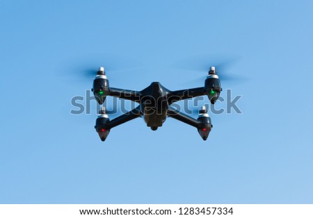 Closeup photo of a flying drone. Drone photo