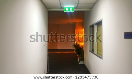 Install fire exit light signs at the fire evacuation way in the building.
