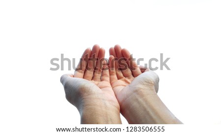 The emaciated hands of the girl begging for something or someone to help her on white background.